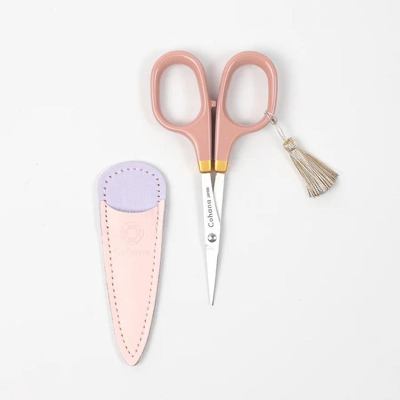 Cohana Sakura 2026 small scissors with pink lacquered handles and pink-and-purple leather case