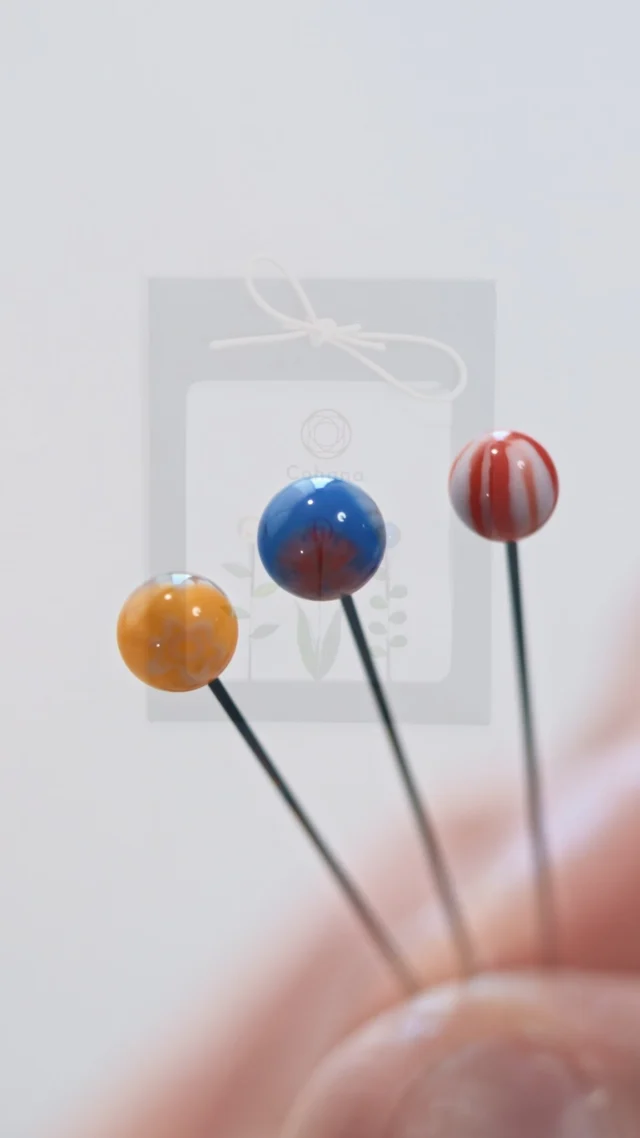 Cover image: Eight Needles: Tombo-dama pins